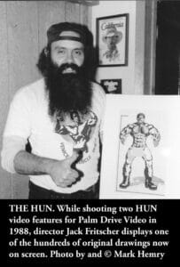 Jack Fritscher holding Hun drawing